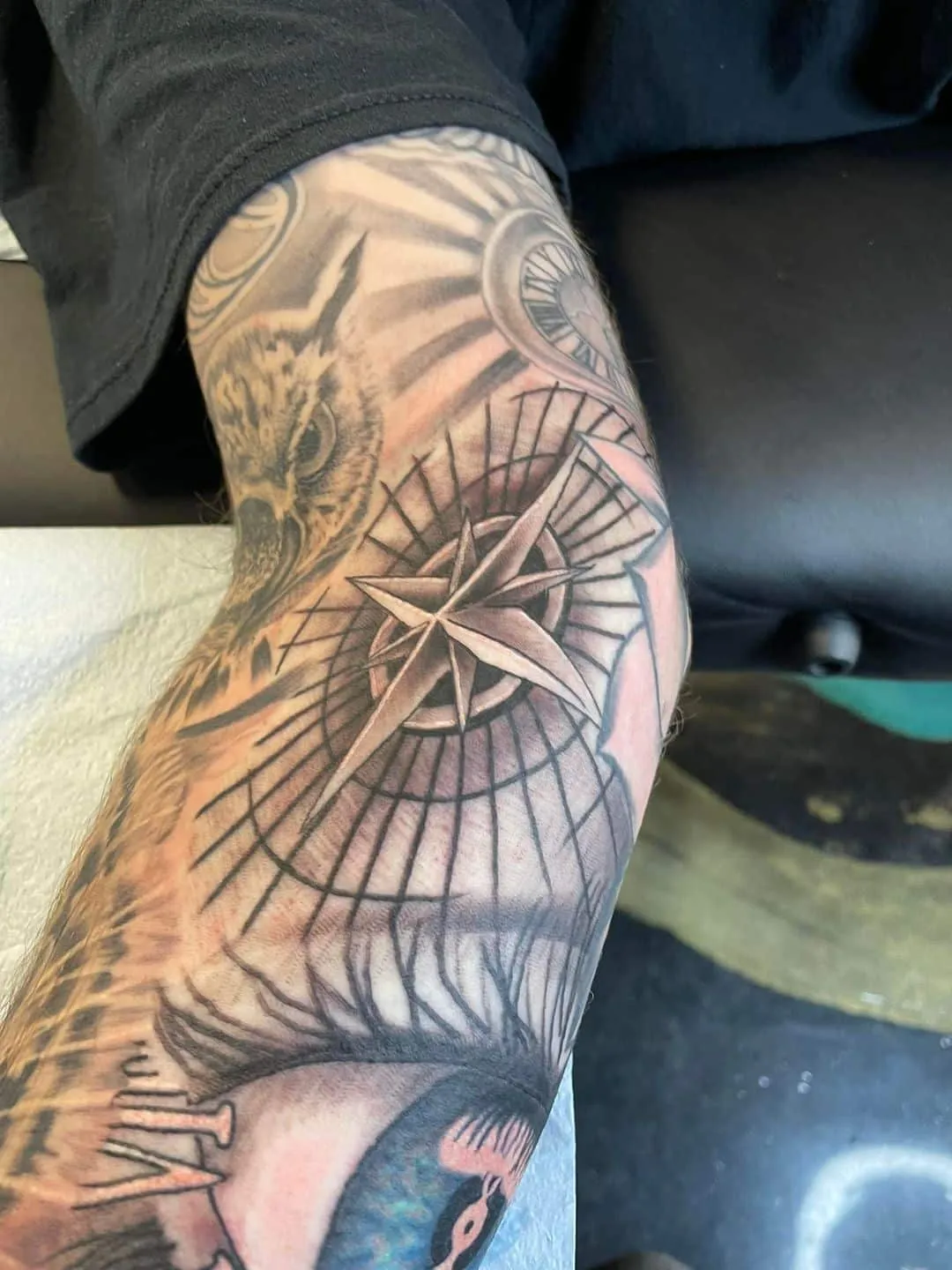 black & grey realism tattoo by TJ Cornelius at Fallen Raven Tattoo Studio in Simpsonville, SC