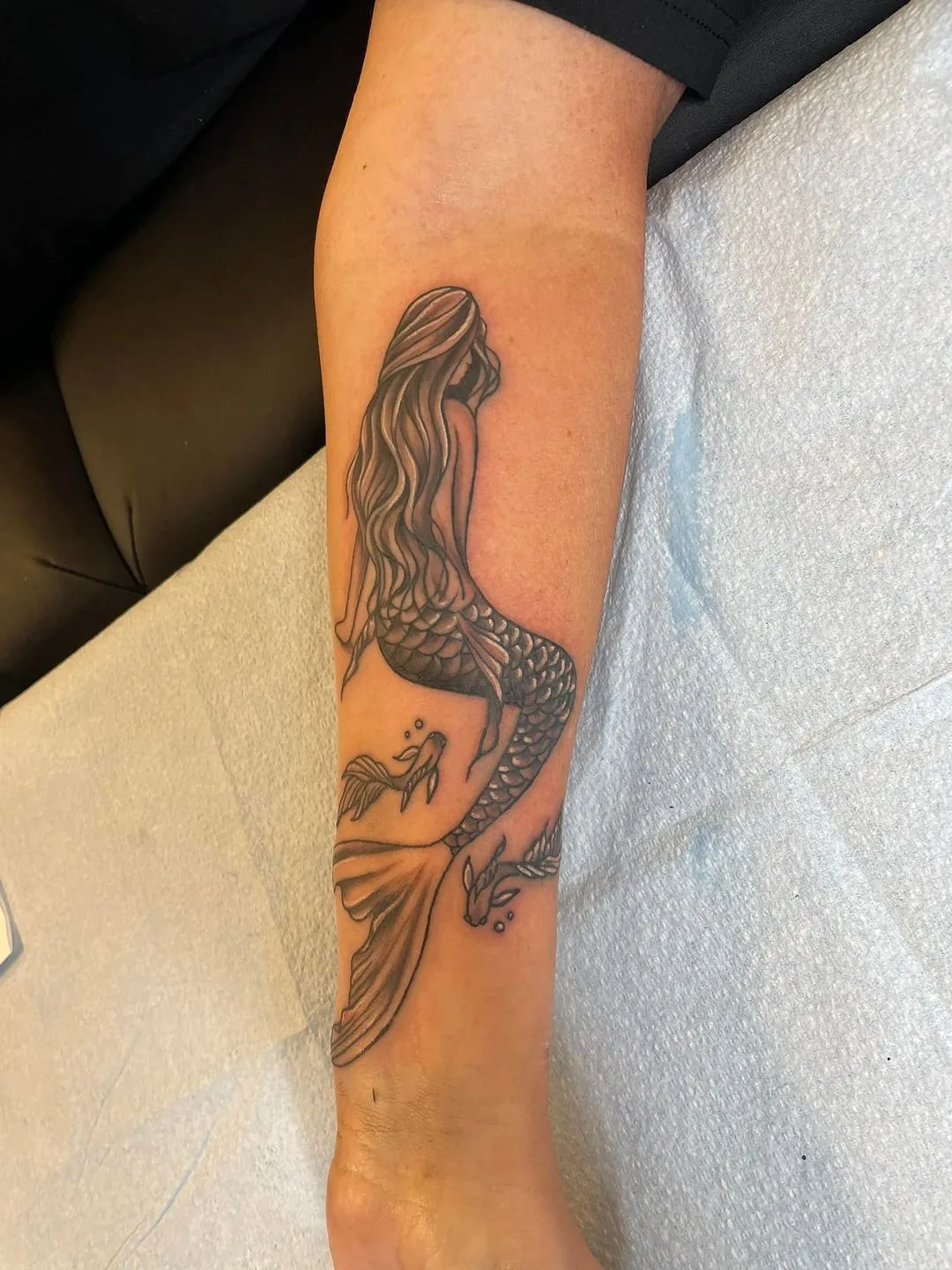 black & grey realism tattoo by TJ Cornelius at Fallen Raven Tattoo Studio in Simpsonville, SC