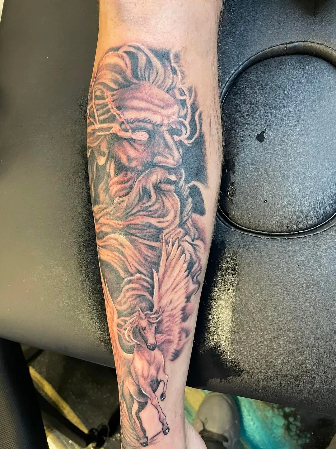black & grey realism tattoo by TJ Cornelius at Fallen Raven Tattoo Studio in Simpsonville, SC