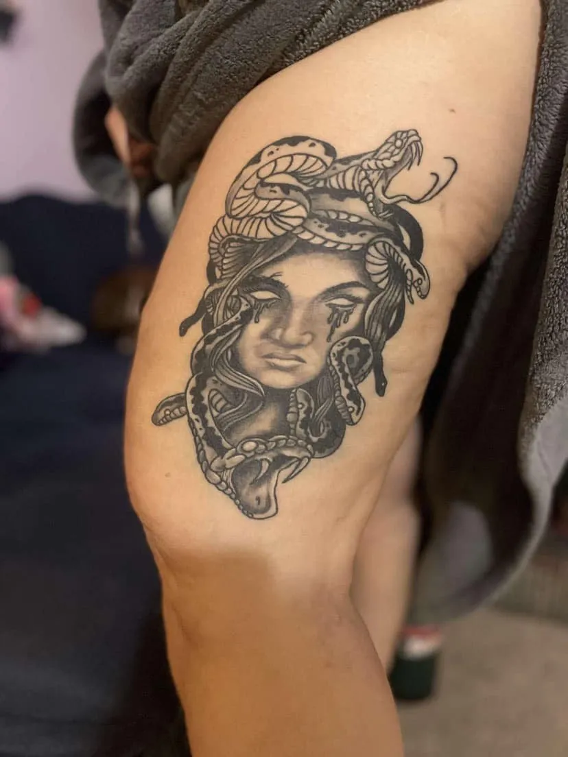 black & grey realism tattoo by TJ Cornelius at Fallen Raven Tattoo Studio in Simpsonville, SC
