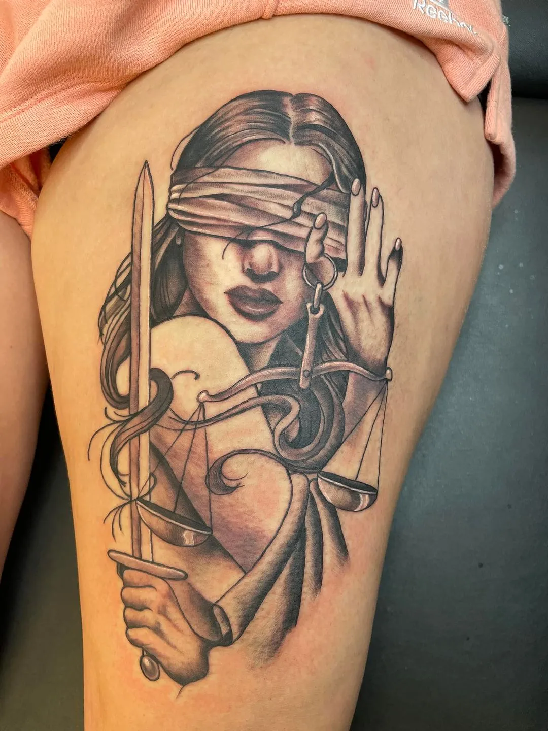 black & grey realism tattoo by TJ Cornelius at Fallen Raven Tattoo Studio in Simpsonville, SC