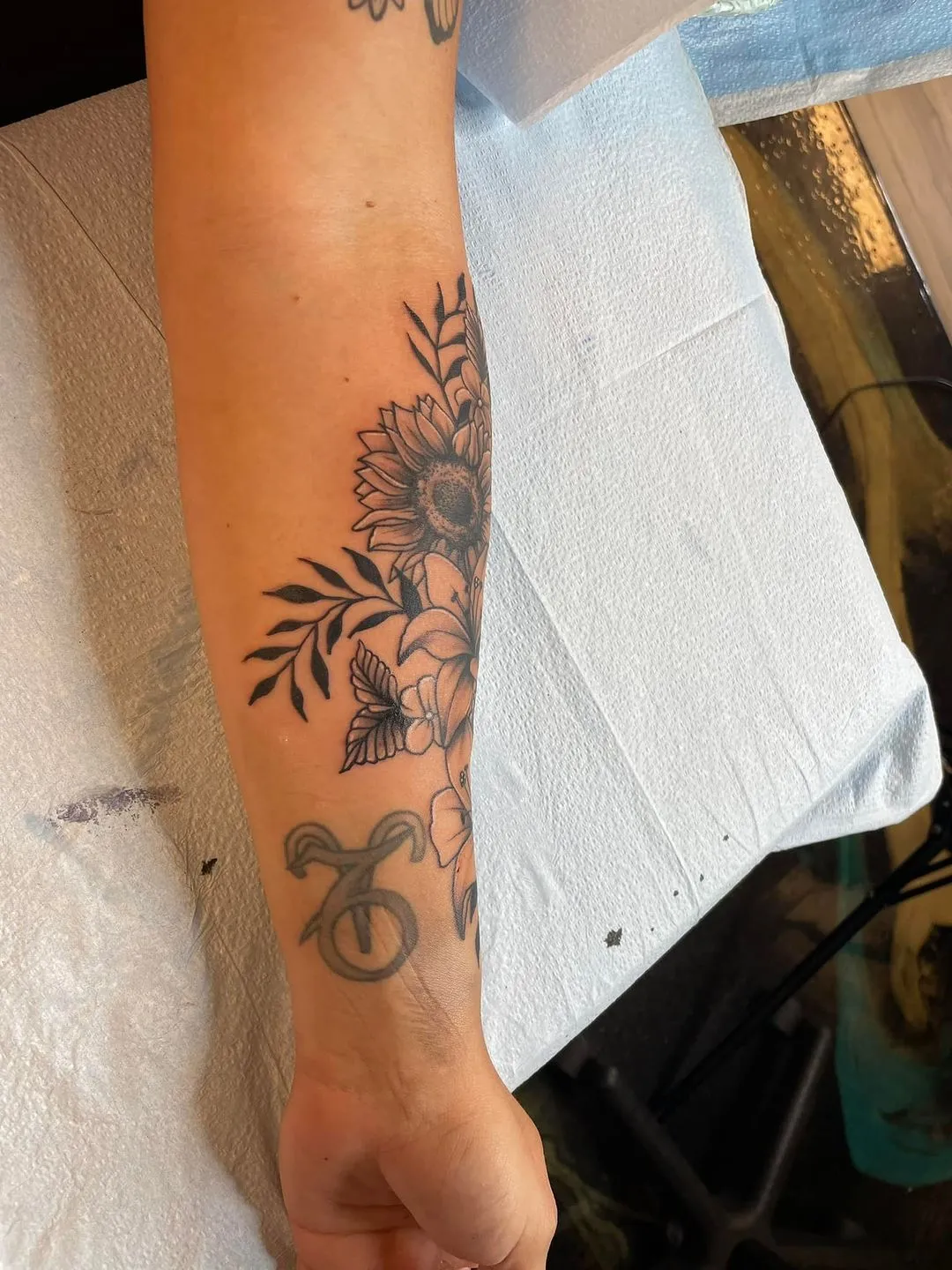 black & grey realism tattoo by TJ Cornelius at Fallen Raven Tattoo Studio in Simpsonville, SC