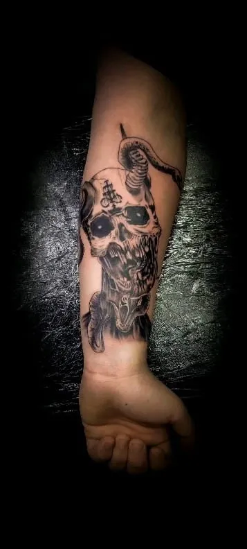 black & grey realism tattoo by Pete Delia at Fallen Raven Tattoo Studio in Simpsonville, SC