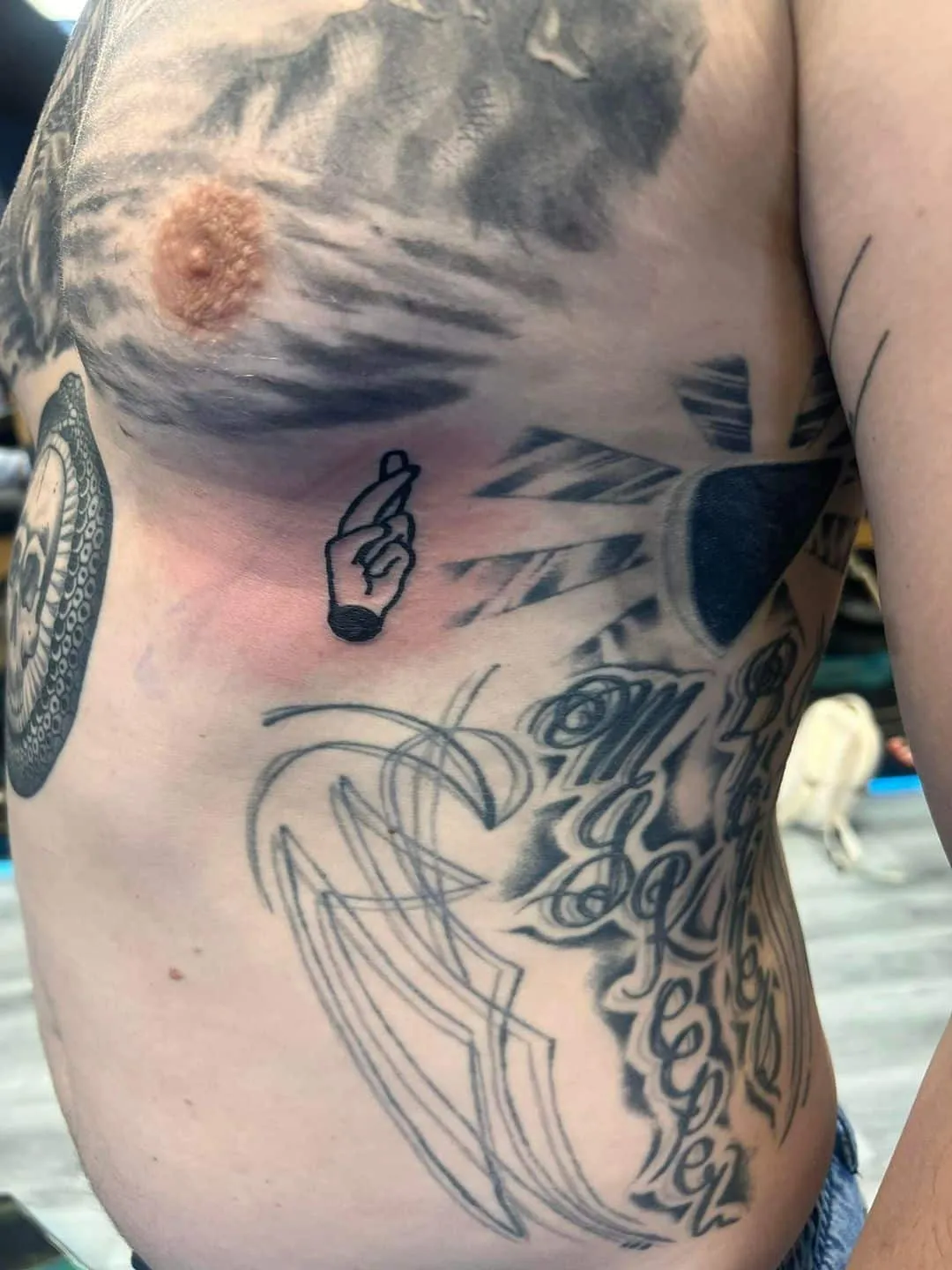 small tattoos tattoo by Trey Couch at Fallen Raven Tattoo Studio in Simpsonville, SC