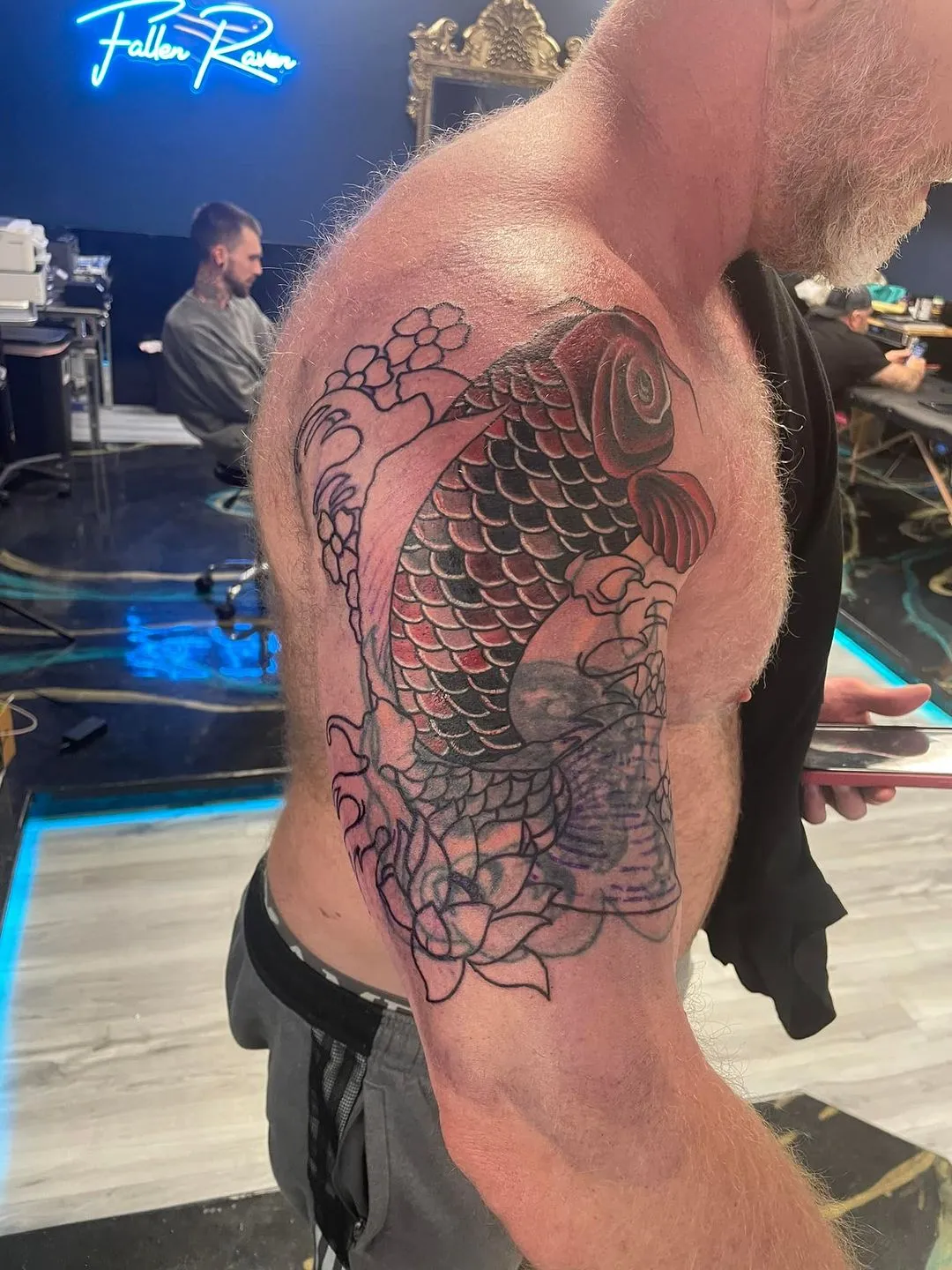 black & grey realism tattoo by TJ Cornelius at Fallen Raven Tattoo Studio in Simpsonville, SC