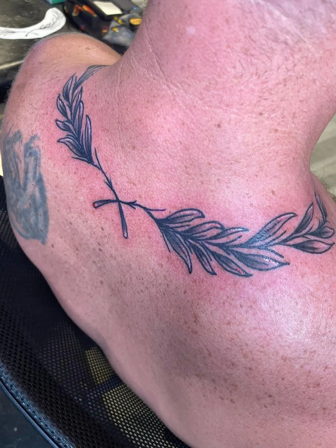 black & grey realism tattoo by TJ Cornelius at Fallen Raven Tattoo Studio in Simpsonville, SC