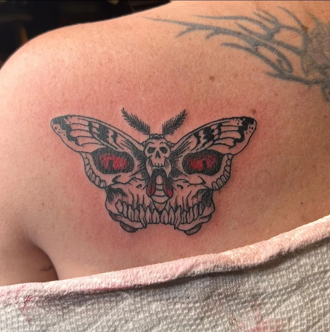 small tattoos tattoo by Trey Couch at Fallen Raven Tattoo Studio in Simpsonville, SC