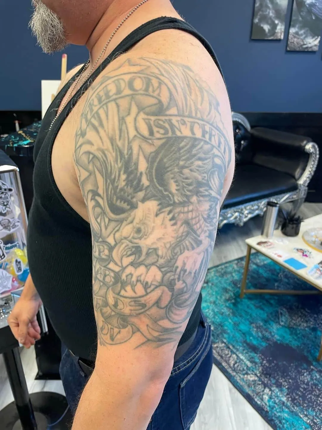 black & grey realism tattoo by TJ Cornelius at Fallen Raven Tattoo Studio in Simpsonville, SC