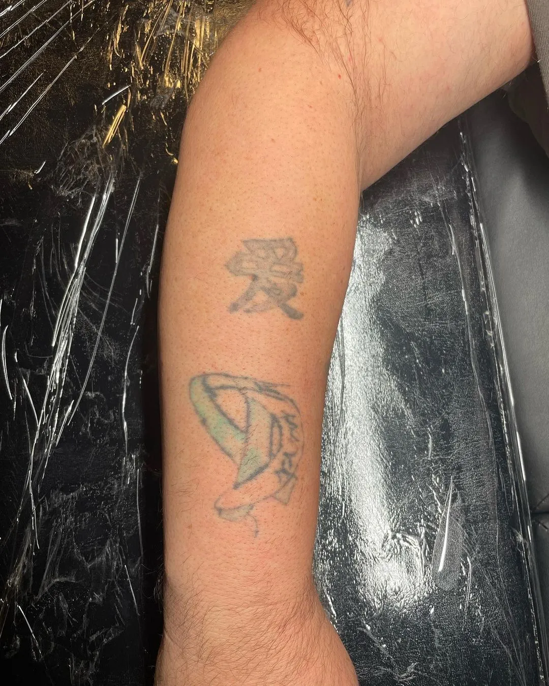 cover-ups tattoo by TJ Cornelius at Fallen Raven Tattoo Studio in Simpsonville, SC